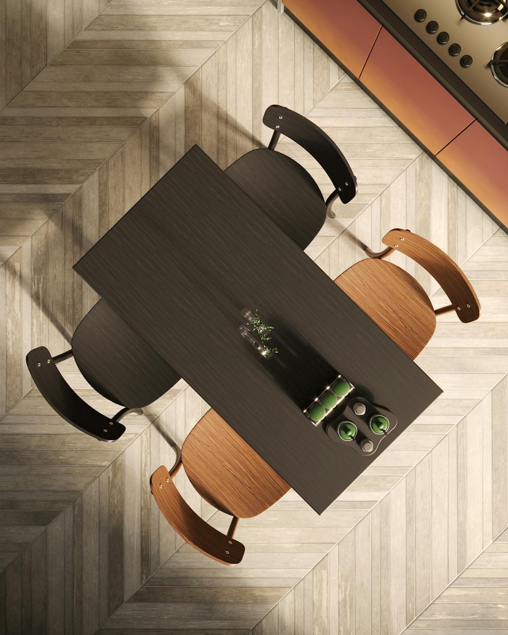 A top-down view of a stylish modern kitchen table with elegant chairs on chevron-patterned flooring.