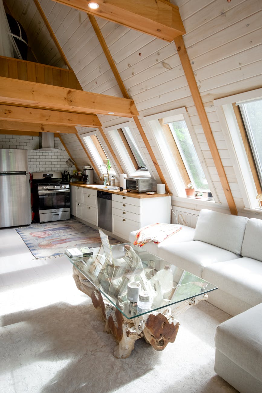Bright and stylish A-frame cabin interior in Stowe, Vermont featuring modern design and rustic elements.